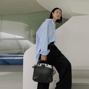 Shortsentence Blue shirt